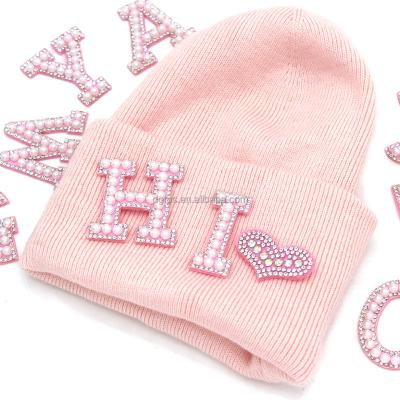 China Sustainable Pink Letter Pearl Small Rhinestone Custom Glass Iron On Patches For Hats for sale