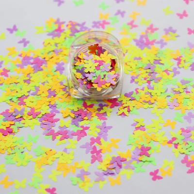 China Eco-Friendly Holiday Decoration PET Glitter Neon Powder Mixed With Thick Butterfly Shape Glitter for sale