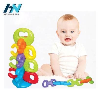 China Soft Safe Non-Toxic Puzzle Bpa Free Silicone Infant Baby Teether Infant Toy for sale