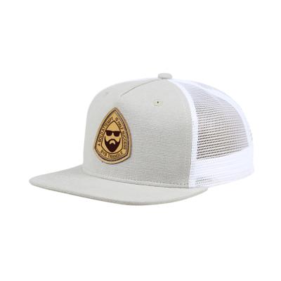 China JOINT Logo Patch Trucker Blank Mesh Hat Custom Leather Snapback Trucker Hat for sale