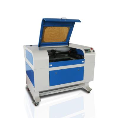 China HT 5070 Professional CO2 Laser Engraving Material Surface Maker / Cutting Machine 50w/60w/80w Non Contact for sale