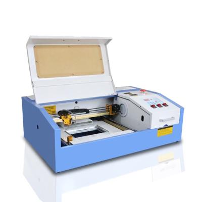 China mini water cooled k40d laser engraving machine for cutting wood fabric for sale