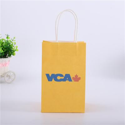 China Recyclable Custom Printed Brown Kraft Paper Shopping Bag With Handles for sale