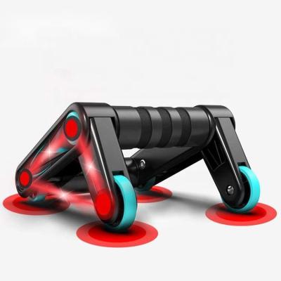 China Universal Muscle Roller Wheel Push Up Bars Stand Up Abdominal Core Strength Trainer for sale