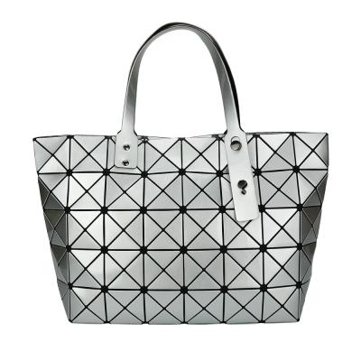 China Solid Color Luminous Waterproof Handbag Geometric Shoulder Tote Bag For Women for sale