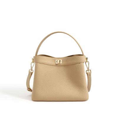 China 2023 PORTABLES simple temperament with solid color bucket cross - body bag for sale