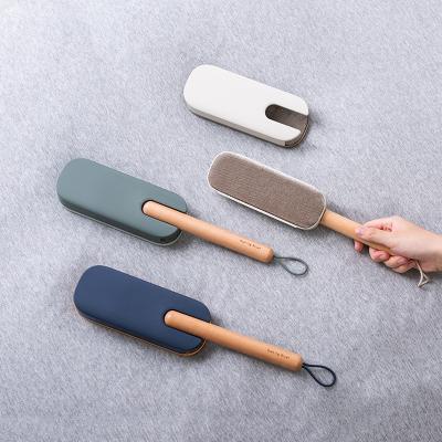 China Sustainable Portable Reusable Remove Fur Carpet Cat Dog Pet Hair Remover Clean Brush for sale