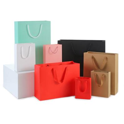 China Recyclable Tote Bag Kraft Paper Bag Clothing Shopping Shoes Purse Pink Blue Green Custom LOGO for sale