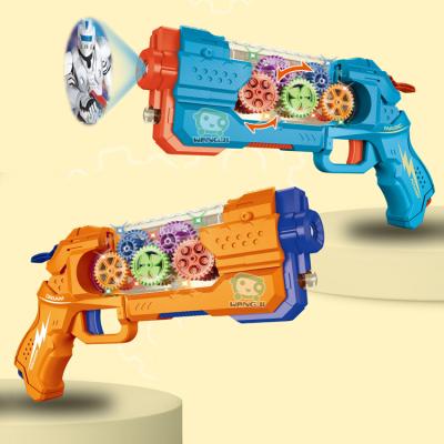 China Toy New Mode Rotation Speed ​​Electronic Visual Light Projection Music Transparent Shell Gun Toy With Light for sale