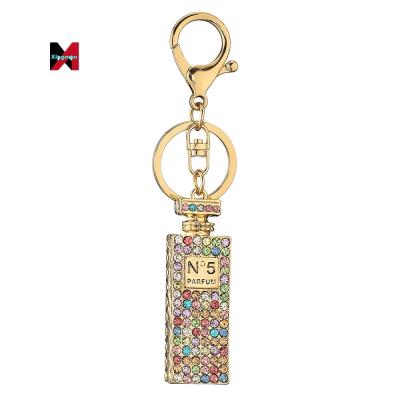 China New Trend 2022 Metal Perfume Bottle Rhinestone Key Chains Metal Handbag For Women Accessories for sale