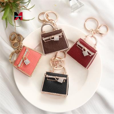 China Creative Leather Rhinestone Alloy Metal Fashion Key Chain Key Chains For Handbag Accessories for sale