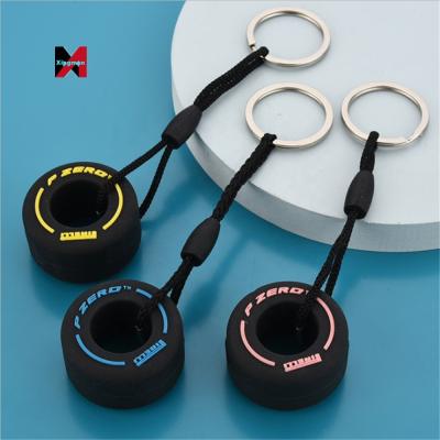 China Fashionable Key Chain Accessories PVC Key Chain Metal Tire Key Chain Toy For Women Men Gift for sale