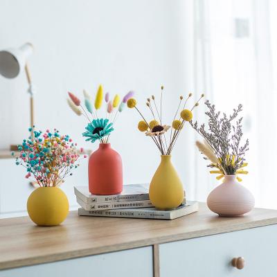 China Bohemian Fashionable Colorful Small Aromatherapy Bottles Decorative Matte Delicate Ceramic Flower Vase Desktop for sale