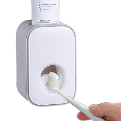 China Wall Mounted Punch Free Lazy Squeezer Automatic Squeeze Toothpaste Squeezer Viable Toothpaste Squeezer for sale