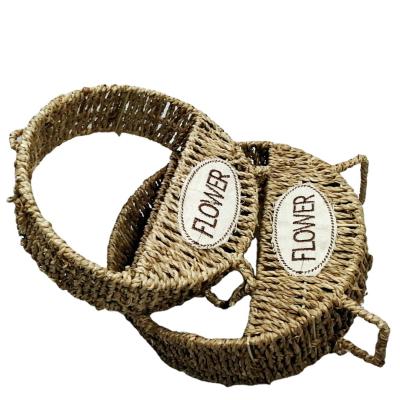 China Beautiful durable cheap price bridesmaid basket fancy wedding wicker small hanging woven basket for flowers for sale