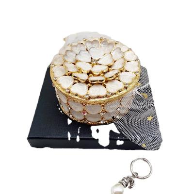 China 2023 Global Exquisite Alloy Flower Love Selling Wedding Gifts Hot High Quality White Beautiful Jewelry Box Table Decoration for sale