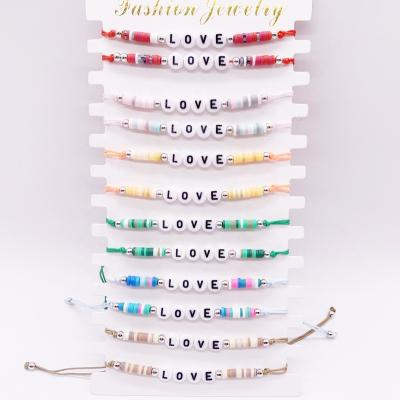 China Custom Rainbow Words Initial Letter Bead Casual/Sporty Colorful Polymer Clay Stacking Bracelet for sale