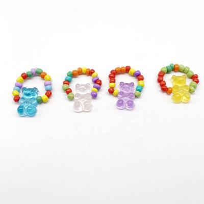 China Candy Cute Elastic Colorful Cute Resin Finger Rings Acrylic Seed Beads Bear Adjustable Gummy Finger Rings for sale