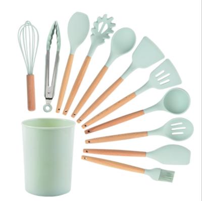 China Sustainable 12 Pieces In 1 Set Kitchen Gadgets Tools Rack Kitchenware Spatula Silicone Cookware Set With Wooden Handles for sale