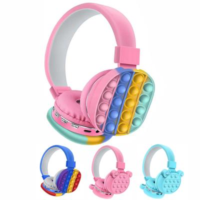 China 2021 Creative Sound Perfect Decompression Silicone Headset Toy Fidget Wireless Headphone Toy Earphone Toy Tie Dye Headphone for sale