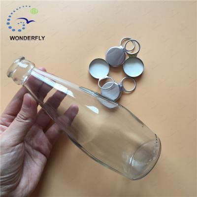 China 290ML Clear Fruit Juice Ring Pull Caps Type Glass Beer Bottle for sale