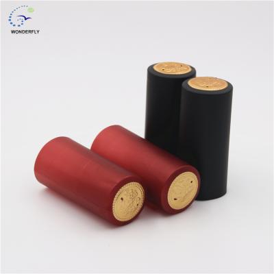 China Non-Refillable Red Heat Shrink Cap Sealing Bath Shower Cap PVC Heat Shrink Cap For Wine Bottle for sale