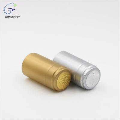 China Non Refillable Custom Golden Color PVC Shrink Sleeve Heat Shrink Cap Seal For Bottles for sale