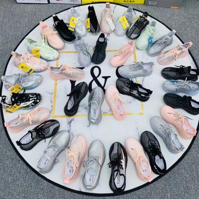 China Fashion trend flying cheap running boys and girls woven children's shoes mixed shoes made in China cheap for sale