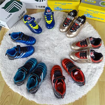 China Cheap Wholesale Kids Shoes Running Shoes Moccasins Soccer Shoes for sale