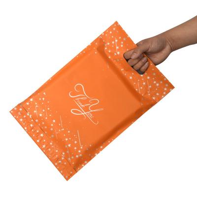 China Biodegradable compostable custom printed orange mailing bag biodegradable polymailers plastic mailing bag for sale