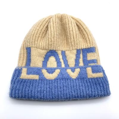 China New Love Beanie Hat Ladies Winter Knitted COMMON Hat Soft Warm Hat for sale