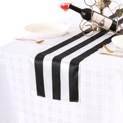 China Beautiful Printed Modern Simple Black And White Striped Tablecloth Decoration Tunner Hotel Wedding Satin Table Runner for sale