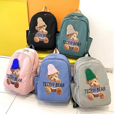 China New fashion waterproof female bag travel backpack large capacity hat bear student cute port bag for sale