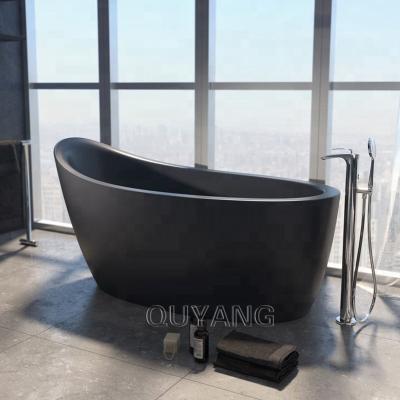 China QUYANG Free Hand Carved Stone European Unique Natural Solid Outdoor Bathtub Design Style Freestanding Black Marble Elegant Bathtub for sale