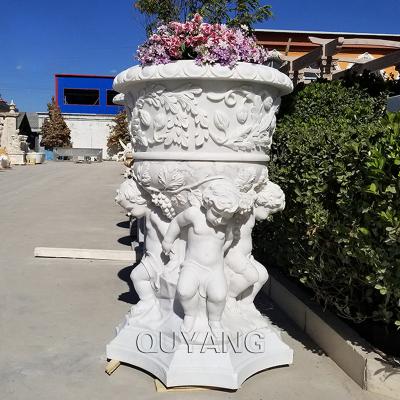 China QUYANG Modern Outdoor Garden Decoration Hand-carved Baby Angel Flowerpots White Marble Large Natural Stone Planter With Statues for sale