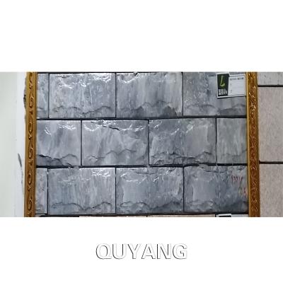 China Europe QUYANG 200*400 New Outdoor Designs Water Proof European Exterior Ceramic Stone Tile Dark Gray Marble Wall Tiles for sale