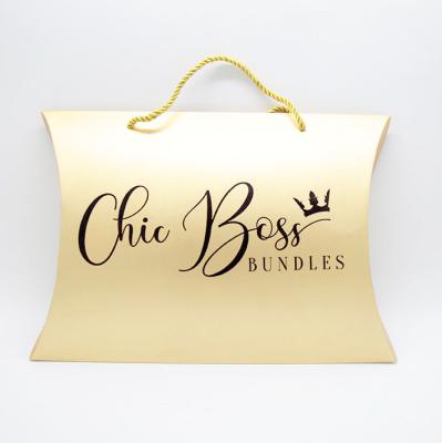 China Recyclable Custom Golden Color Paper Pillow Box Hair Bundle Packaging With Twist Handle for sale