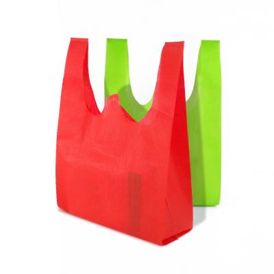 China Eco - Friendly Custom Shopping Non Woven Cheap T - Shirt Carrier Bag With Logo for sale