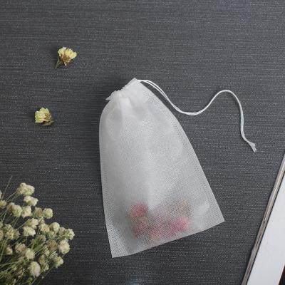 China Cheap Custom Logo Printing Drawstring Tea Bag Eco - Friendly Non Filter Woven Fabric Roll for sale