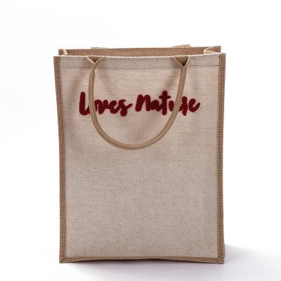 China Factory direct sales workmanship exquisite jute wine bag portable wine purse packaging/decor bag for sale