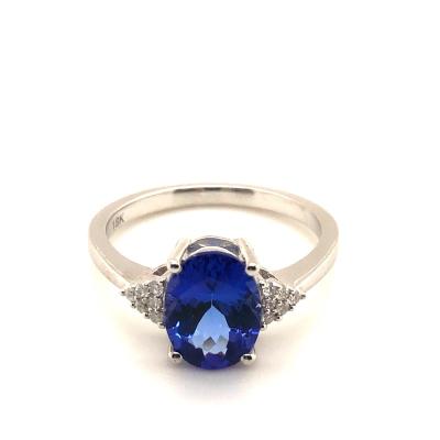 China Wholesale Natural Soft Charm Textured Tanzanite Faceted Oval Luxury 18K Gold Gemstone Rings For Women Couple for sale