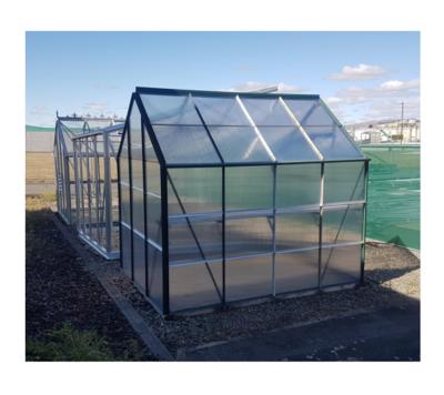 China Keep Warm And Grow In The Garden Raised Flower Garden Mini Indoor Greenhouse Poly Carbonate Garden Greenhouse for sale