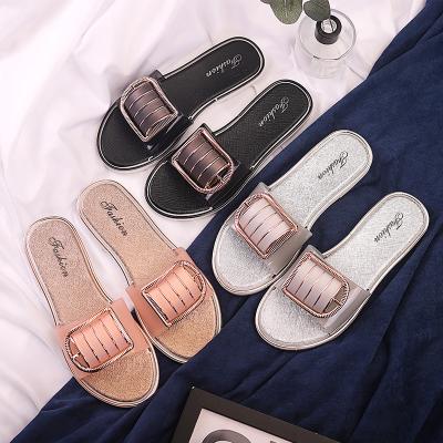 China Flip Flops Fresh Metal Buckle PVC Flat Bottom Simple Soft-soled Slippers Fashion Trend Outdoor Korean Women's Slippers for sale