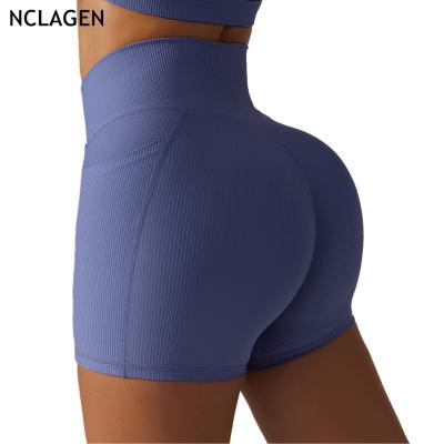 China Breathable Cross Waist Hip Biker Lifting Running Shorts With Pockets Women Gym Workout Shorts Good Rib Fabric Active Yoga Leggings for sale