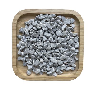 China Modern Tumbled Snow Gray Pebble Stone For Marble Decoration for sale