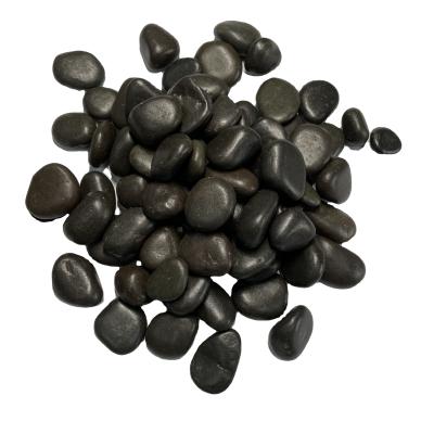 China Modern Riverstone Polished Black Pebble Stone For Garden Landscaping for sale