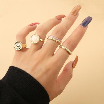 China 4pcs/set Fashion Bohemian White Enamel Round Adjustable Metal Ring Sets Geometric Twist Open Ring Sets for sale