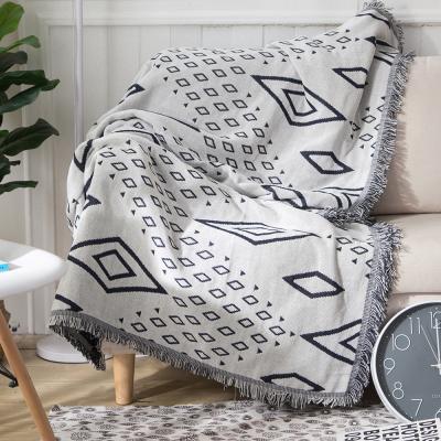 China Low MOQ Jacquard Style Vintage Waterproof Geometric Cotton Woven Throw Blanket For Travel for sale