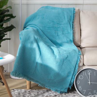 China Low Price Plain Style Waterproof High Quality Blue Tassel Waffle Custom Woven Blanket for sale