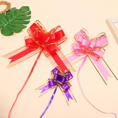 China 2022 wholesale large iridescent organza pull bows with gold line colorful butterfly pull bow for gift decoration 6.4cm 100 pieces for sale